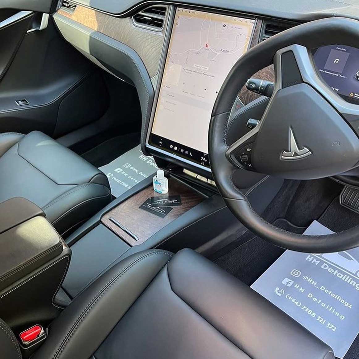 Premium printed paper floor mat showcasing luxury design in a clean vehicle interior